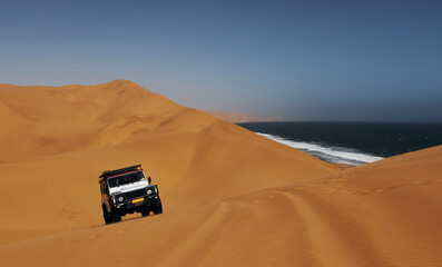 Fototapeta na wymiar Car in the deserts of Africa, Namibia