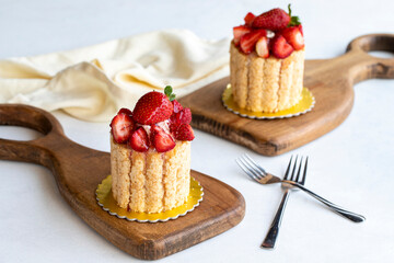 Strawberry cake. Strawberry log cake on a white background. Bakery products. close up