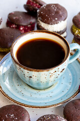 Coffee. Good morning coffee surrounded by cookies on a white background. close up