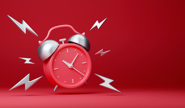 Red vintage ringing alarm clock with silver lightings