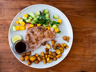 backed potato with tuna steak