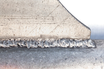 Welding seam connecting aluminum parts. Aluminum welding.