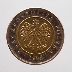 Poland - circa 1996 : a 5 zloty coin of Poland showing the heraldic animal of Poland the eagle with spread wings