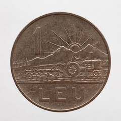 Romania - circa 1966: a 1 leu coin of romania showing a landscape and a tractor with a plow working...