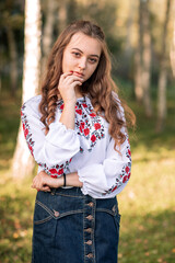 The girl, the Ukrainian in an embroidered shirt, the girl in an embroidered shirt