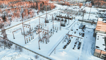 Electrical substation in snow winter. Aerial view