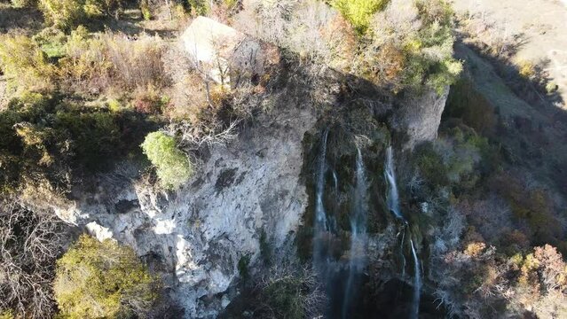 Aerial Autumn view of Polska Skakavitsa waterfall at Zemen Mountain, Kyustendil Region, Bulgaria