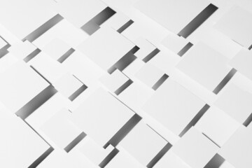 White geometric background of fly rhombuses in hard light with strict gradient dark shadows, top view. Modern abstract background in futuristic style.