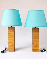 two turquoise floor lamps, a floor lamp on a neutral background, handmade isolated on a white...