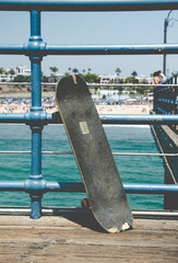 Naklejka premium Skateboard on Pier