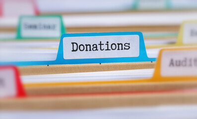 File folders with a tab labeled Donations