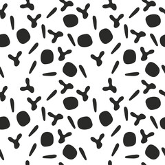 Fototapeta na wymiar Shapeless black objects on a white background. Vector seamless pattern.