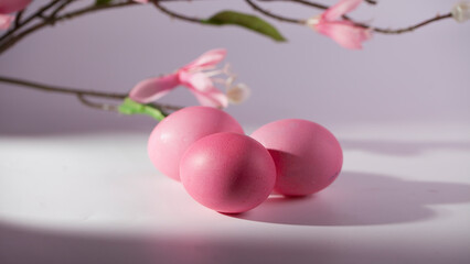 Easter eggs in a beautiful and simple composition with decorations