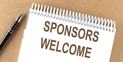 SPONSORS WELCOME text on a notepad with pen, business concept