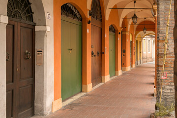 Fototapeta premium Typical Bolognese street with arcades. Bologna, Italy, is the city in the world with the most arcades.