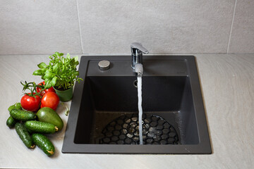 vegetables in a kitchen neaw sink