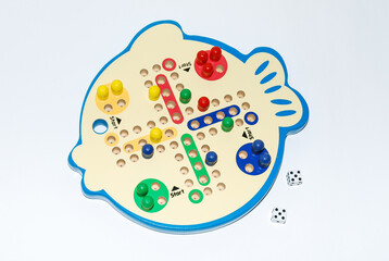 Wooden toy for baby, children isolated on white background. Board game for 4 people.