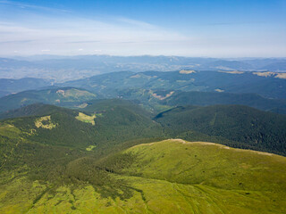 Obraz premium High mountains of the Ukrainian Carpathians in cloudy weather. Aerial drone view.