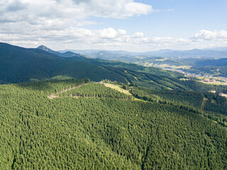 Fototapeta na wymiar High mountains of the Ukrainian Carpathians in sunny weather. Aerial drone view.