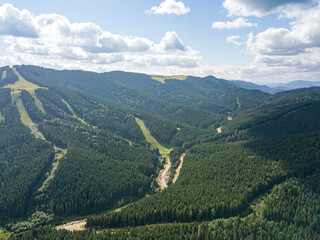 High mountains of the Ukrainian Carpathians in sunny weather. Aerial drone view.