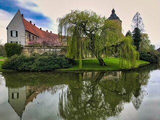 Fototapeta na wymiar A beautiful water castle around Steinfurt in the picturesque Münsterland 