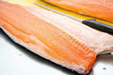 Red salmon fish. salmon fillet on the table. Healthy eating red salmon fish. Photo on fish production.