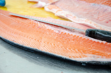 Red salmon fish. salmon fillet on the table. Healthy eating red salmon fish. Photo on fish production.