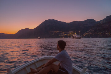 Fototapeta premium silhouette of a person on a boat