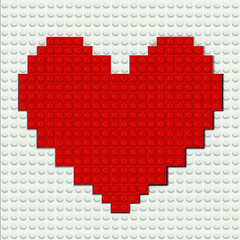 Vector realistic illustration of red heart from plastic bricks on white baseplate