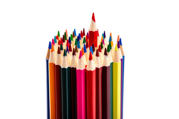 A set of colored pencils standing vertically isolated on a white background