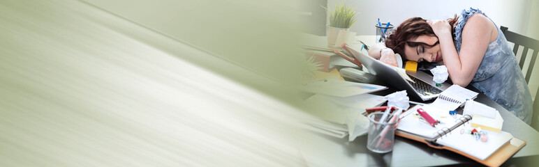 Overworked businesswoman sitting at a messy desk; panoramic banner