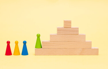 Career ladder and wooden chips: conceptual image
