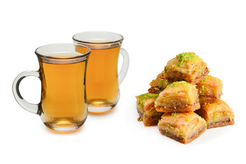 Turkish sweet baklava with turkish tea isolated on a white background. .