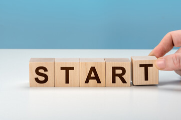 Wooden blocks with word START. Start, Start up, new career or new business, start to success or...