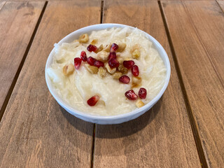 Traditional Ramadan Dessert Gullac with Pomegranate Seeds.