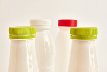 Plastic bottles for drinks on a white background. Plastic packaging. Disposal of plastic. Plastic recycling. Plastic garbage.
