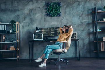 Portrait of attractive dreamy girl technician web developer sitting in chair resting nap at...