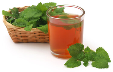 Lemon balm leaves with herbal tea