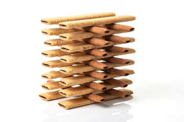 Pyramid of sweet crispy cookie sticks. confectionery sweet products. high-calorie food for tea and coffee