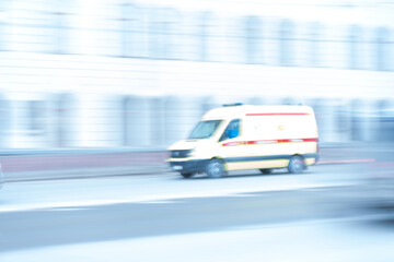 Plakat ambulance car racing through the city