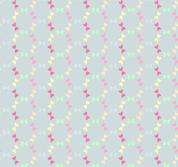 Sweet butterfly seamless pattern in pastel colours. Heart shaped butterflies arranged in circles.