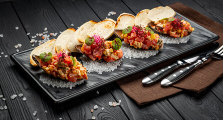 Tuna ceviches, mussels and caviar on mussel shells