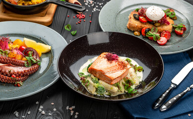 Grilled salmon steak in a creamy sauce.
