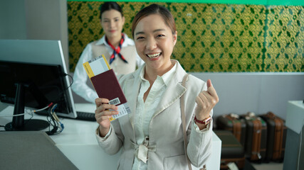 young woman holding passport travel smiling happy