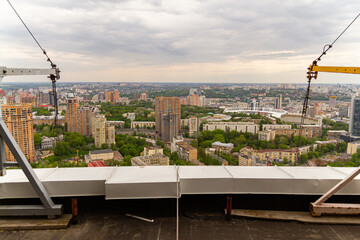 Obraz premium Ukraine, Kyiv – May 02, 2015: Aerial panoramic view on central part of Kyiv from a roof of a high-rise building