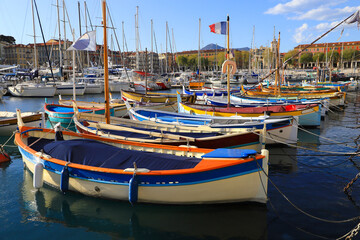 Fototapeta premium Fishing Boats and sail boats in the port of Nice - France
