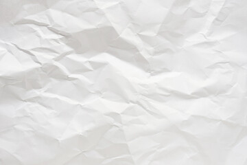White crumpled paper texture background.