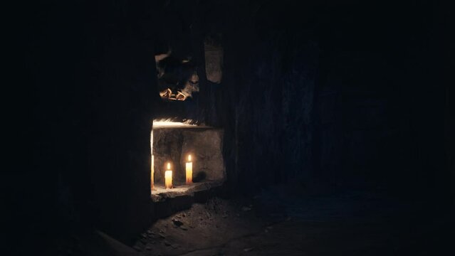 old dark catacombs with candles