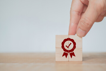 businessman's hand completed sign of top service quality assurance, guarantee, standards, ISO...