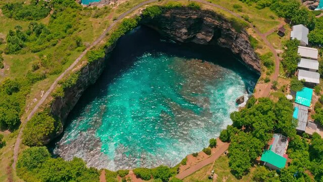 Beautiful Bali beach, Broken Beach (Pantai Pasih Uug) Devil's Billabong  with scenery stone bridge and nature pool on nature background Bali, Indonesia 4K